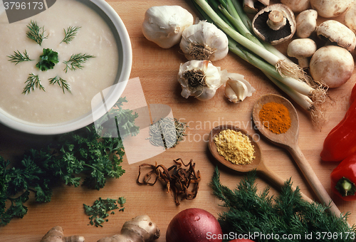 Image of Creamy Soup with Ingredients on Butcher Block