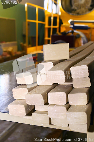 Image of Pieces of soap on a conveyor belt