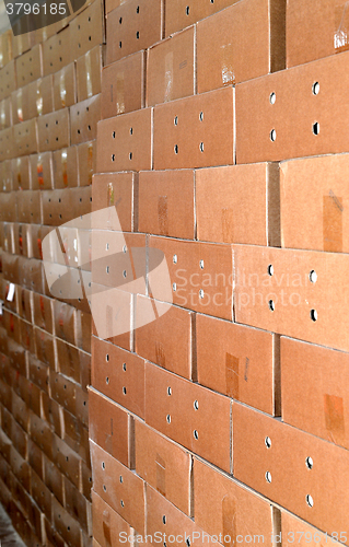 Image of Cardboard packing boxes in a warehouse, background