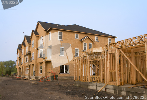 Image of Housing under construction in various stages of development