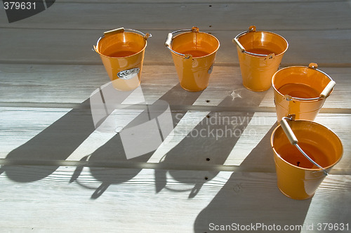 Image of Shadows on a wooden floor.