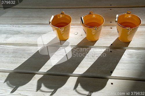 Image of Shadows on a wooden floor.