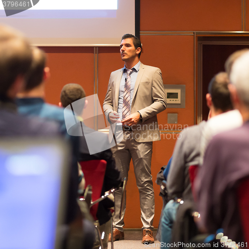 Image of Speaker Giving a Talk at Business Meeting.