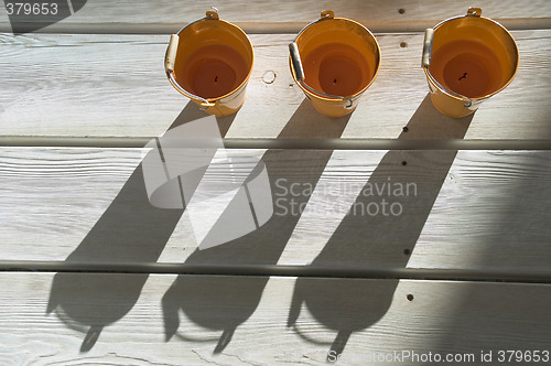 Image of Shadows on a wooden floor.