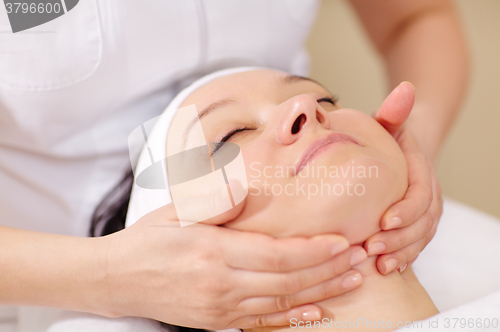 Image of Facial massage at beauty treatment salon