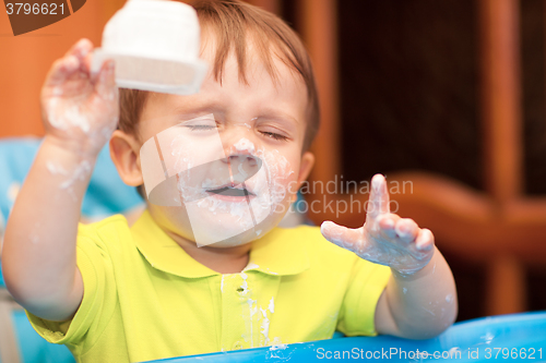 Image of Little boy crying with face got dirty