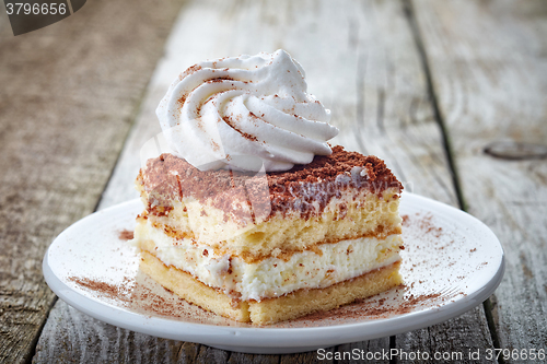 Image of cake with whipped cream