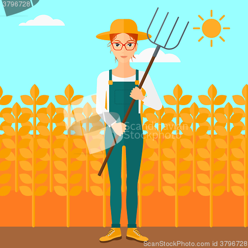 Image of Farmer with pitchfork.