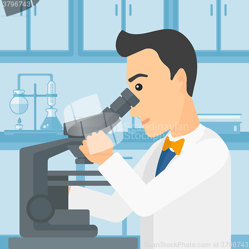 Image of Laboratory assistant with microscope.