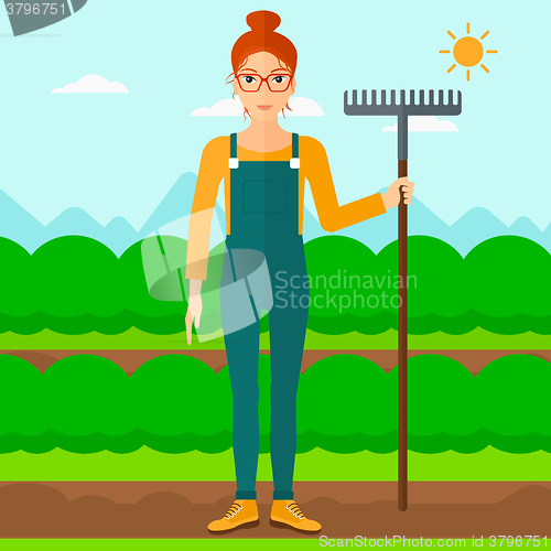 Image of Farmer with rake.