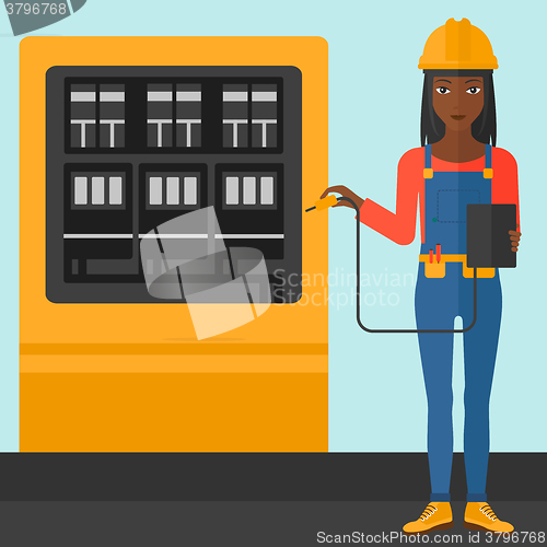 Image of Electrician with electrical equipment.