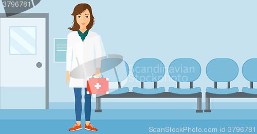 Image of Doctor with first aid box.
