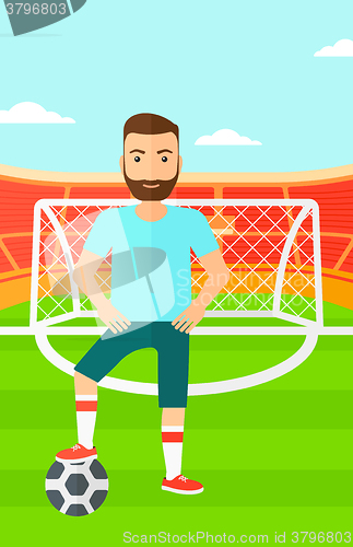 Image of Football player with ball.
