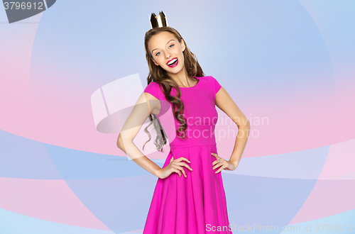Image of happy young woman or teen girl in pink dress