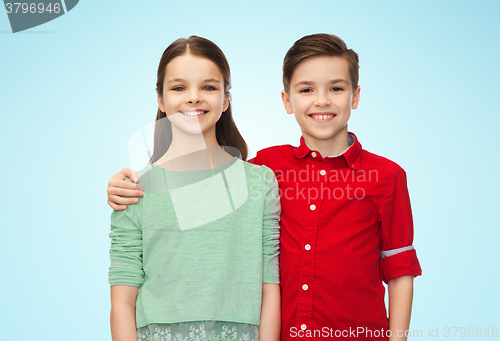 Image of happy boy and girl hugging