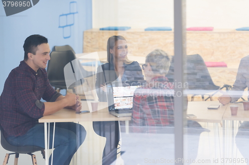 Image of startup business team on meeting at modern office