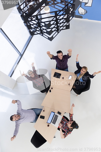 Image of aerial view of business people group on meeting