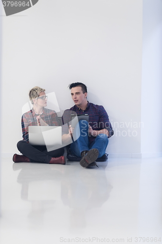 Image of startup business, couple working on laptop computer at office