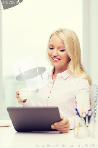 Image of smiling businesswoman or student with tablet pc