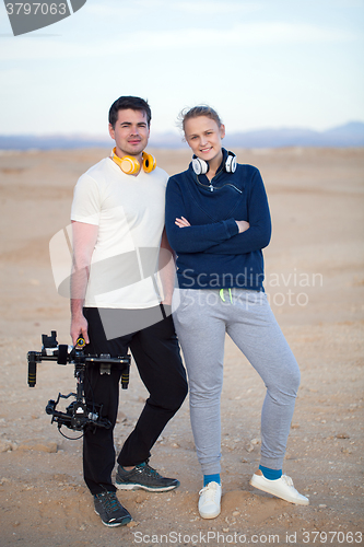 Image of Young people with steadycam on the beach