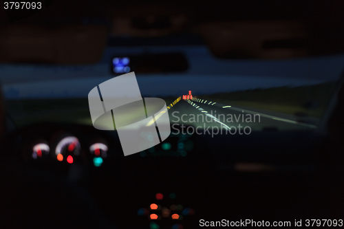 Image of Car driving at night