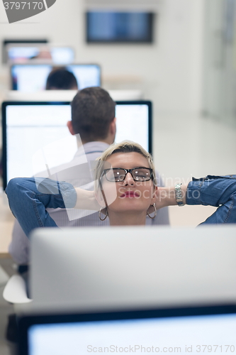 Image of startup business, woman  working on desktop computer