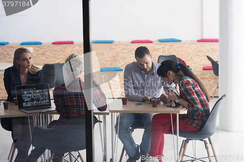 Image of startup business team on meeting at modern office