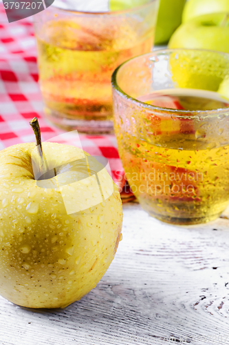 Image of apple and glass of juice