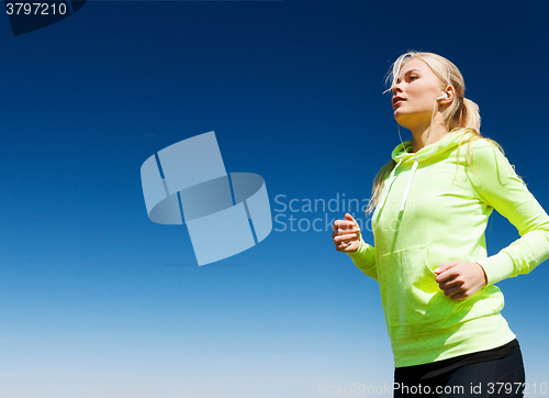 Image of woman doing running outdoors