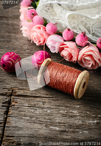 Image of Beads and spool of thread