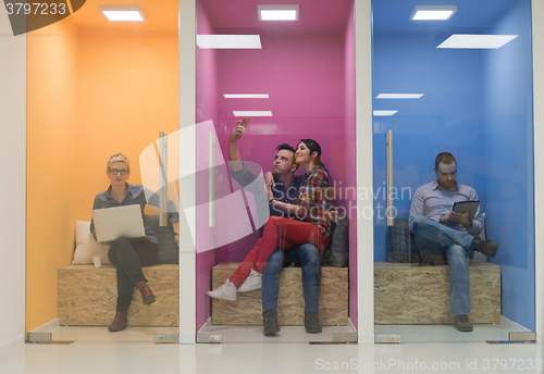 Image of group of business people in creative working  space