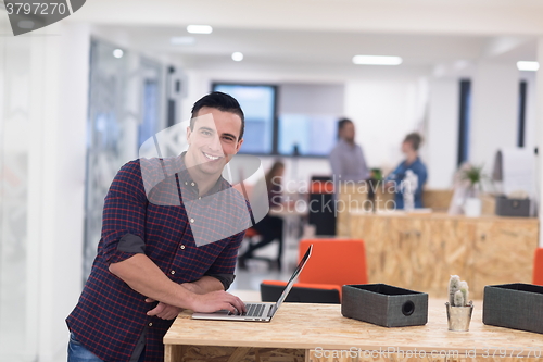 Image of startup business, young  man portrait at modern office