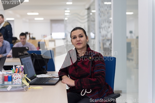 Image of startup business, woman  working on laptop