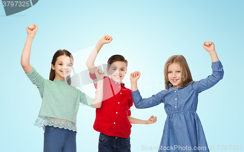 Image of happy boy and girls celebrating victory