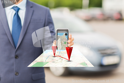 Image of close up of business man with smartphone navigator