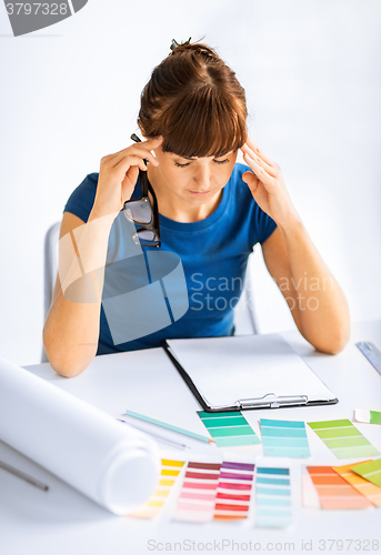 Image of stressed interior designer