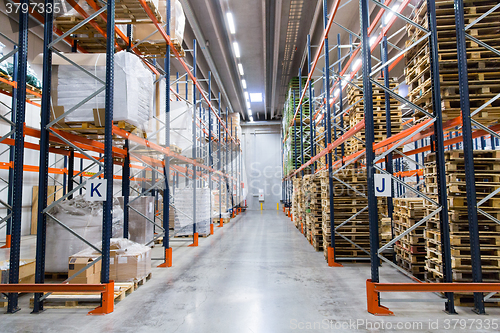 Image of cargo boxes storing at warehouse shelves