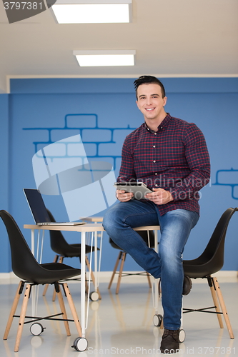 Image of young startup business man portrait at modern office