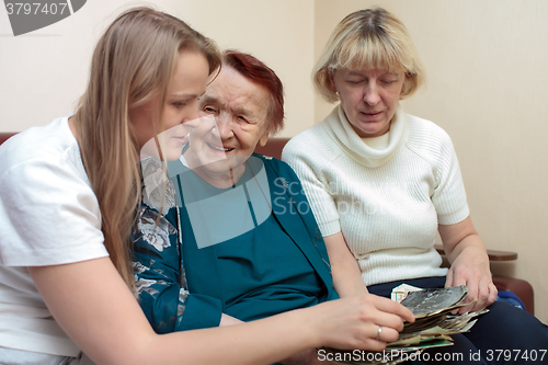 Image of Grandmother, mom and daughter bonding