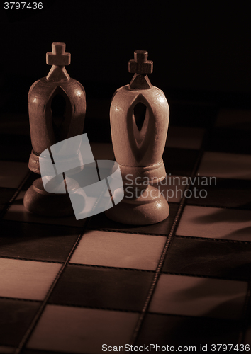 Image of White and black kings on the chessboard