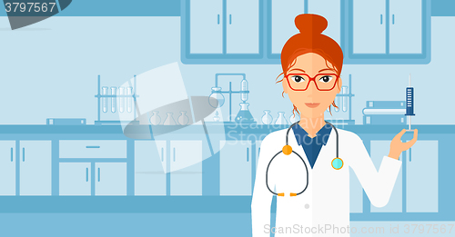 Image of Doctor with syringe in laboratory.