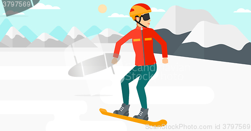 Image of Young woman snowboarding.