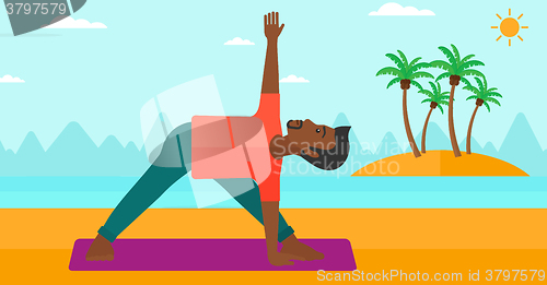 Image of Man practicing yoga.