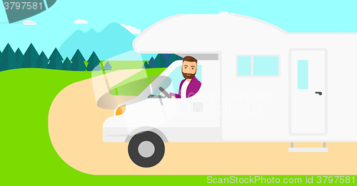 Image of Man driving motor home.