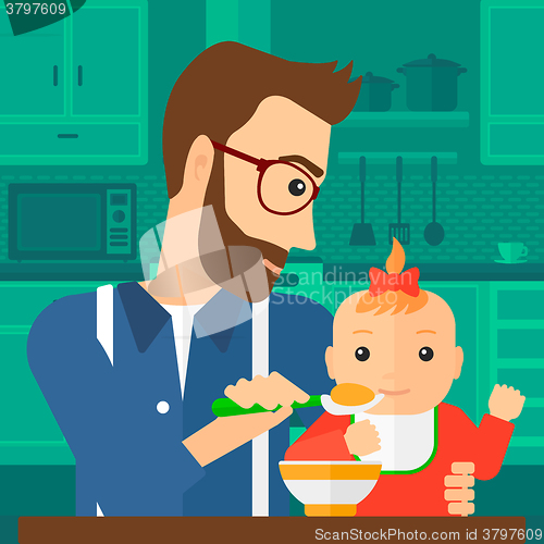 Image of Man feeding baby.