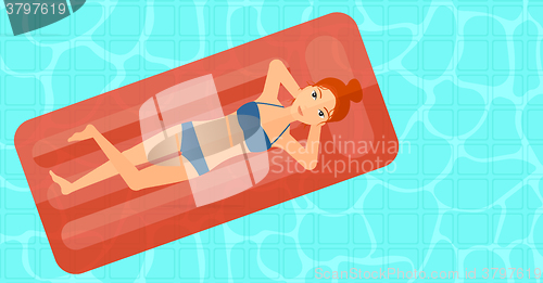 Image of Woman relaxing in swimming pool.