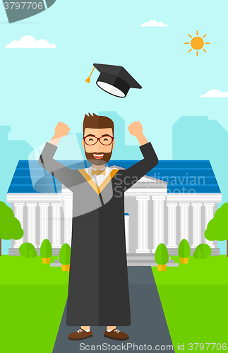 Image of Graduate throwing up his hat.