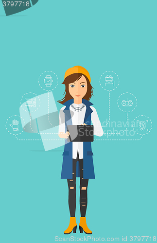 Image of Woman holding tablet computer.