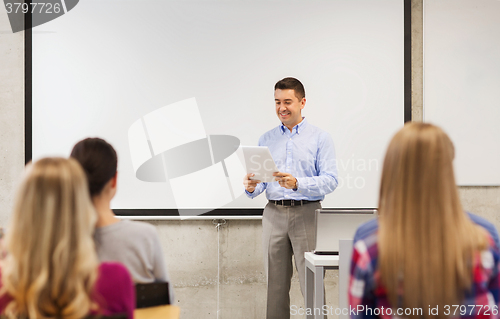 Image of group of students and teacher with notepad