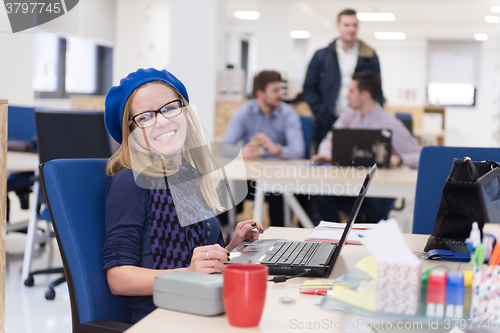 Image of startup business, woman  working on laptop